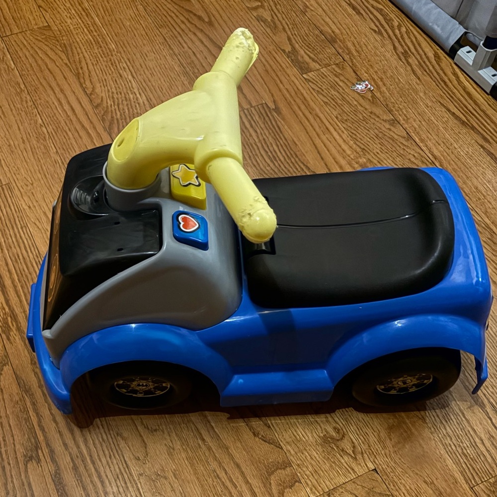 Little people Ride-On Toy Car with fold down race track